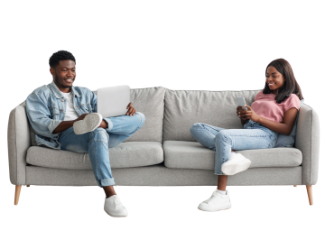 people sitting on a couch and smiling